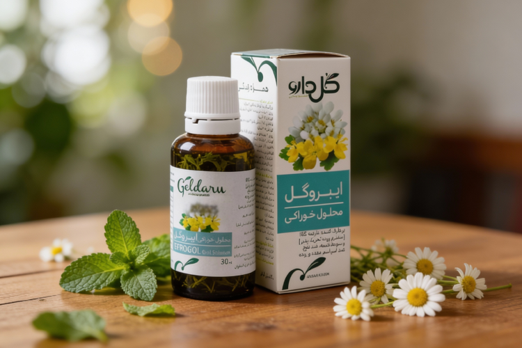 قطره ایبروگل برای بهبود گوارش روی میز چوبی با گیاهان دارویی